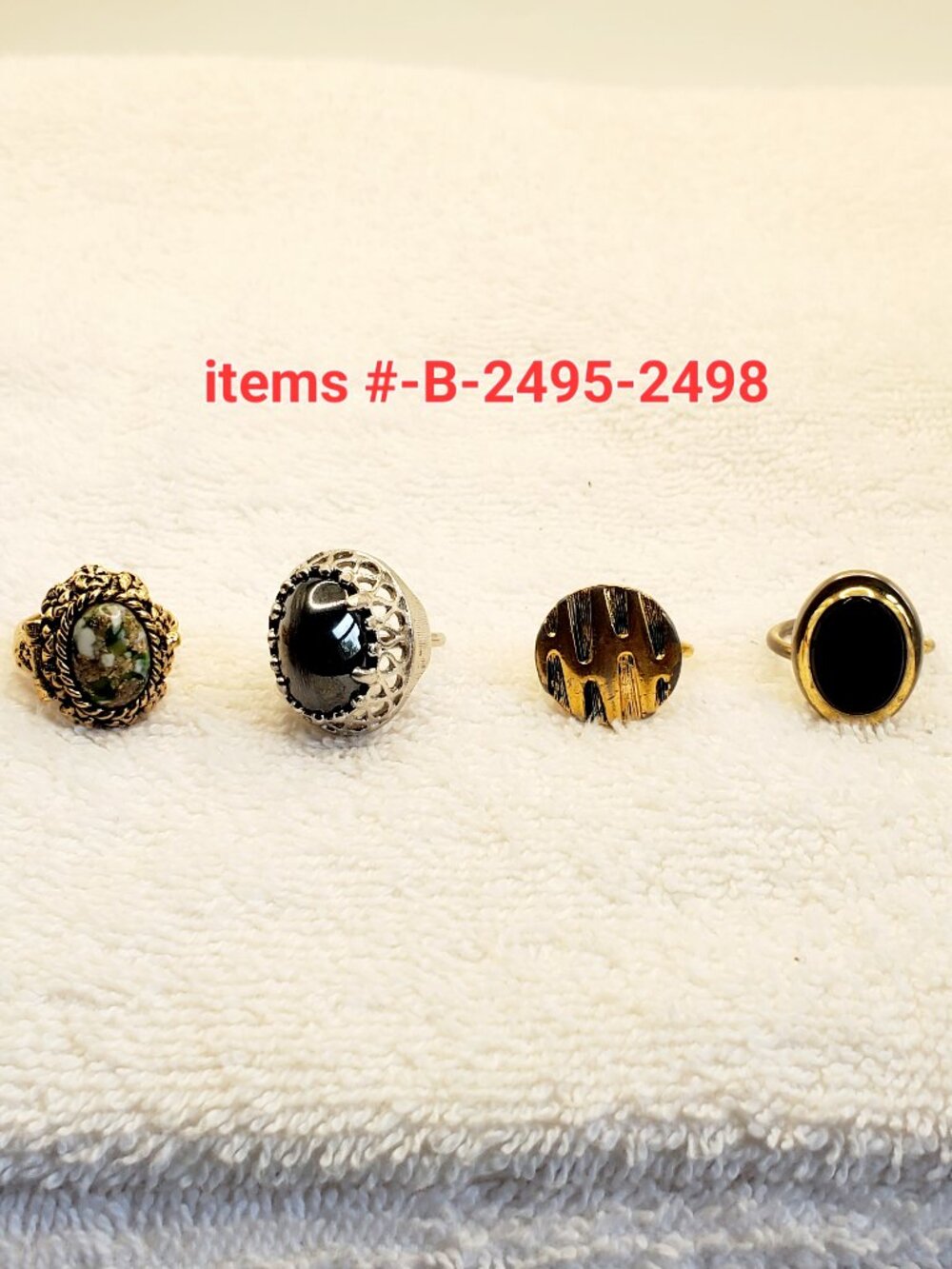 4 SARAH COV. Rings, items #B-2495-2498. wt. 33 grams.